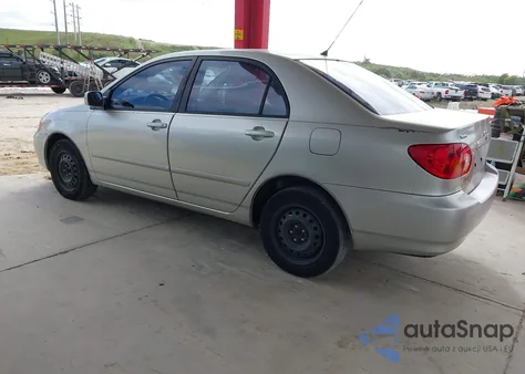 2003 Toyota Corolla Le z USA, uszkodzony, nr VIN JTDBR32E030024022